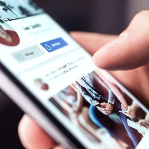 Checking social media on a smart phone